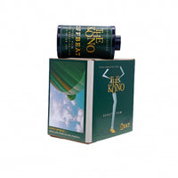 A roll of Kono Off-Beat effect film resting on top of its dark green box packaging, which features a graphic of a hot air balloon in the sky.