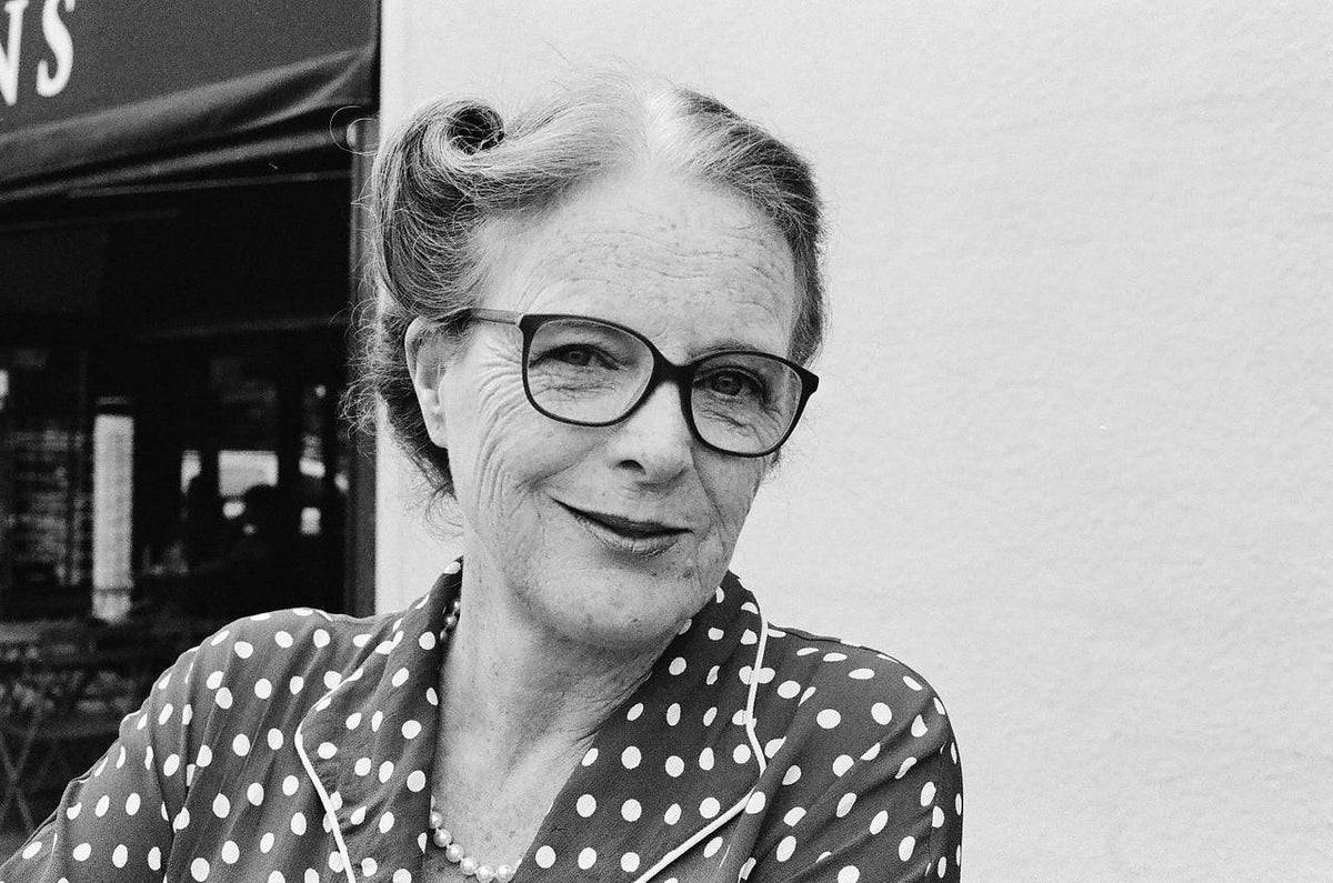 Black and white photographic image of a lady with glasses shot with Lomography lady grey film