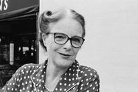 Black and white photographic image of a lady with glasses shot with Lomography lady grey film