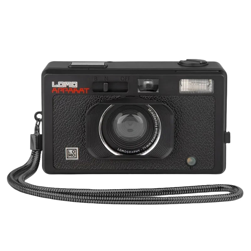 Black camera with white Lomo text and red Apparat text with a camera strap on a white background