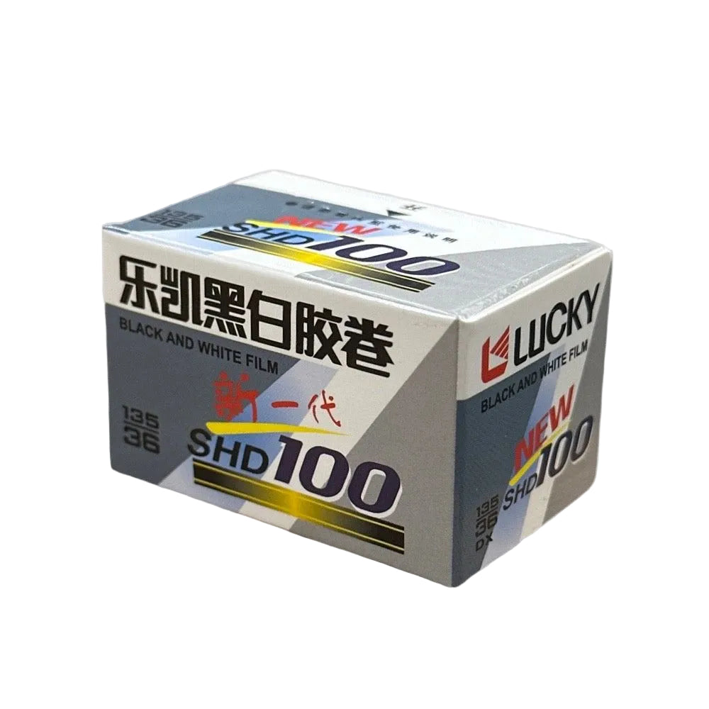 Lucky SHD100 black and white film box on a gray background