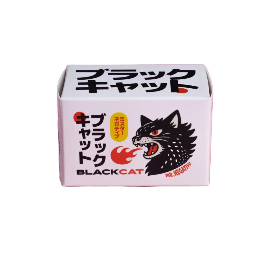Product packaging with black cat illustration and Japanese text on a white background