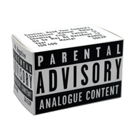 A small rectangular product box with a black-and-white Parental Advisory label design on the front, photographed on a white background. The box includes warning text and the text 'Mr.