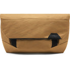 Tan nylon bag or sling bag with black accents on a white background