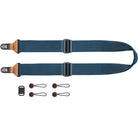 Blue camera strap with accessories on a white background