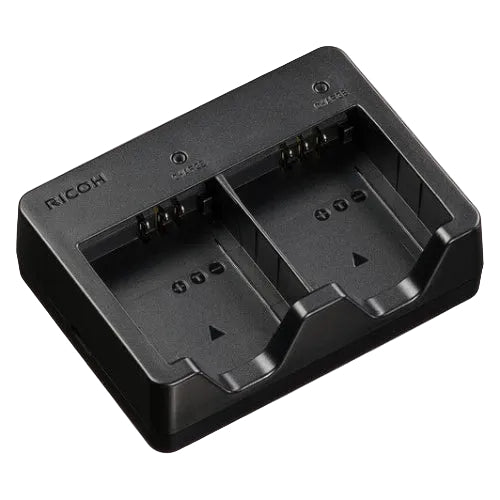 Black Ricoh dual battery charger on a white background