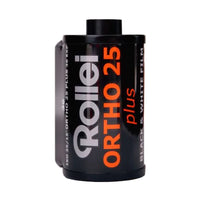 Film canister with grey, orange, and red print saying 'Rollei ORTHO 25 plus' on a white background
