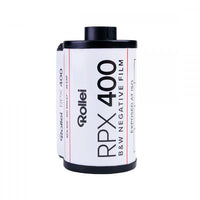 A roll of Rollei RPX 400 B&W Negative Film film canister, featuring a white label with black text and red accent lines, set against a plain white background.