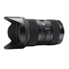 Camera lens with focus and shift buttons on a white background