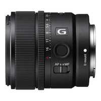 Camera lens with focus and aperture controls on a white background