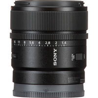 Sony 24mm f/1.4G lens in black with white markings and a silver focus switch, shown on a white background.