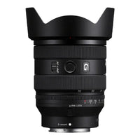 Camera lens with focus and aperture controls on a white background