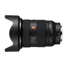 Camera lens with 'G' mark on a white background
