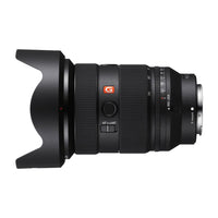 Camera lens with 'G' mark on a white background