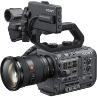 Sony camera with lens and accessories on a white background