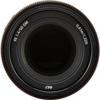 Close-up of a camera lens with technical specifications on a white background