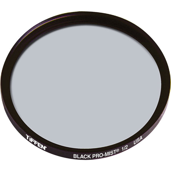 A Tiffen Black Pro-Mist 1/2" circular camera lens filter with a dark metallic rim and a gray glass center, shown on a plain white background.