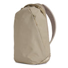 Beige backpack on a white background