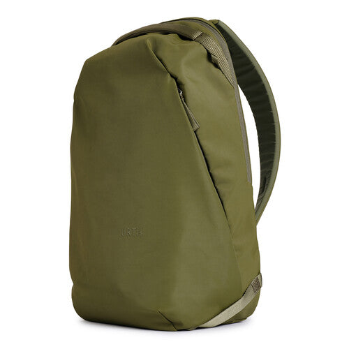 Green backpack on a white background