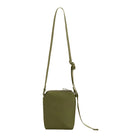 Green crossbody bag on a white background