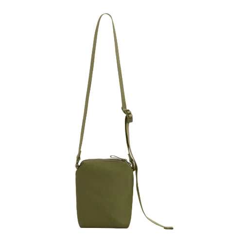 Green crossbody bag on a white background