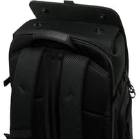 Close-up of a black backpack with visible branding on a white background
