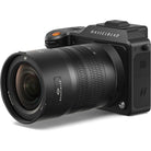 Hasselblad camera body with lens on a white background