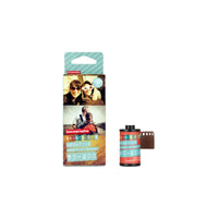 Lomography film roll with packaging featuring a photo of a couple on a white background