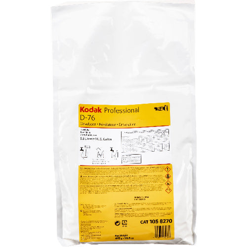 A sealed white bag with yellow and black labeling for Kodak Professional D-76 black and white film developer.