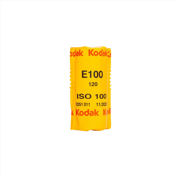 A single roll of Kodak Ektachrome E100 120 color film, predominantly yellow with black text and red accents.