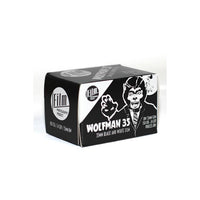 Black and white box of FPP Wolfman 100 ISO 35mm film featuring a werewolf illustration and 24 exposure branding.