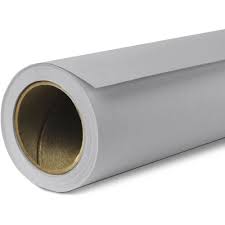 A roll of Savage Fashion Gray Seamless Paper used for creating smooth and even backgrounds in photography and videography.