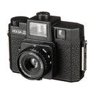 Black Holga 120GCFN medium format film camera with a 60mm glass lens, built-in flash, and textured plastic body.