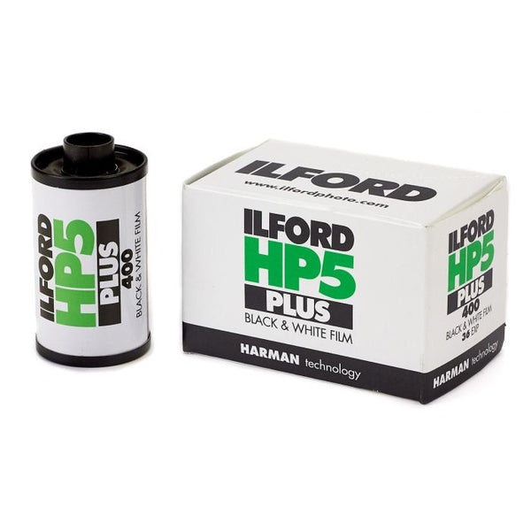 ILFORD HP5 PLUS black & white film can and packaging box with brand and product information.
