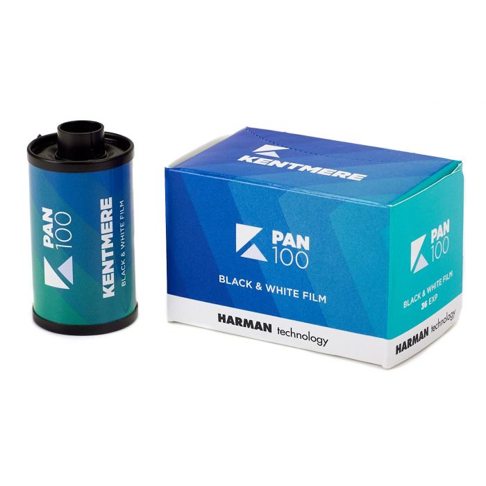 A Kentmere 100 black & white film roll and a box with the brand Harman technology printed on it.