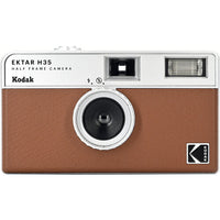 A green and silver Kodak Ektar H35 half frame film camera with a built-in flash.
