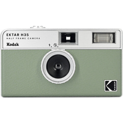 A green and silver Kodak Ektar H35 half frame film camera with a built-in flash.