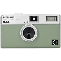 A green and silver Kodak Ektar H35 half frame film camera with a built-in flash.