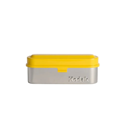Kodak metal box with yellow lid on a white background