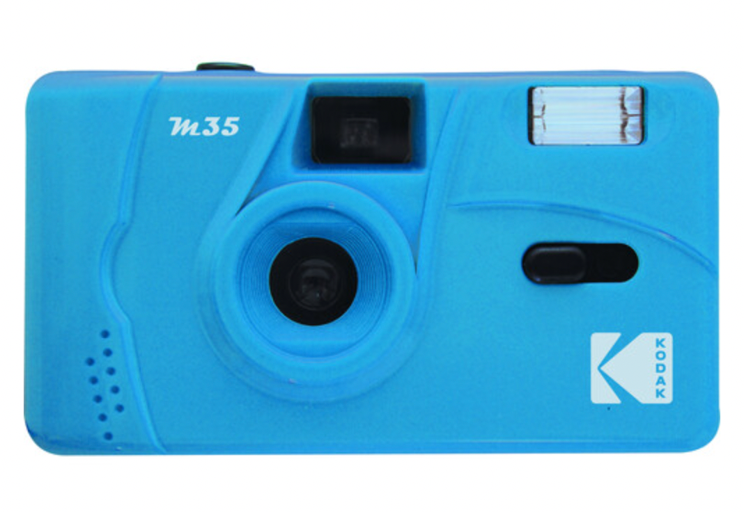 Bright blue Kodak M35 35mm reusable film camera with a fixed-focus lens, built-in flash, and white Kodak logo.