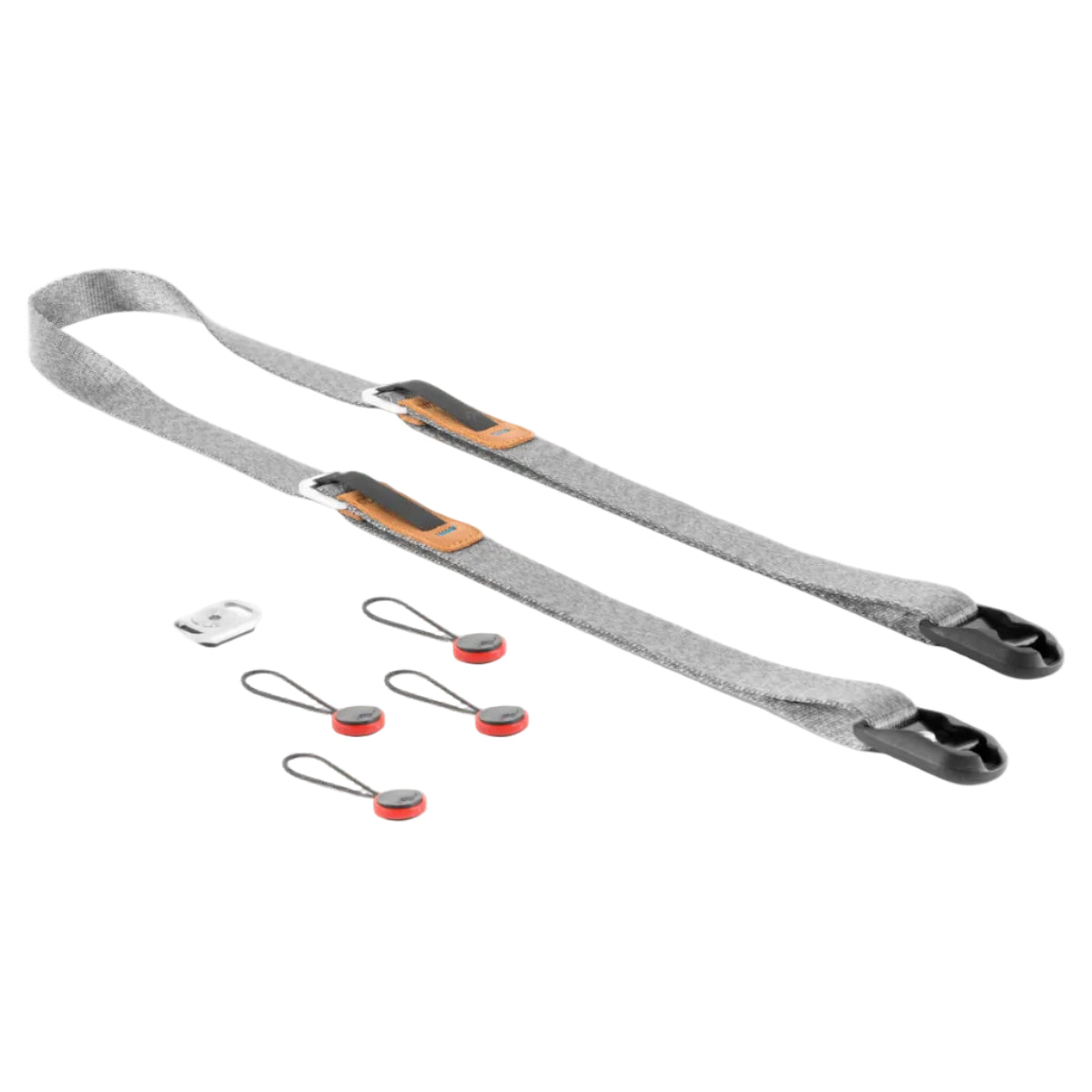 The image shows a camera strap system from Peak Design, including the strap itself in gray with orange details, several Anchors, a microfiber pouch, and a 4mm hex wrench.