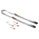 The image shows a camera strap system from Peak Design, including the strap itself in gray with orange details, several Anchors, a microfiber pouch, and a 4mm hex wrench.