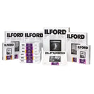 Ilford photographic paper packages on a white background