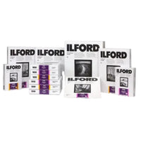 Ilford photographic paper packages on a white background